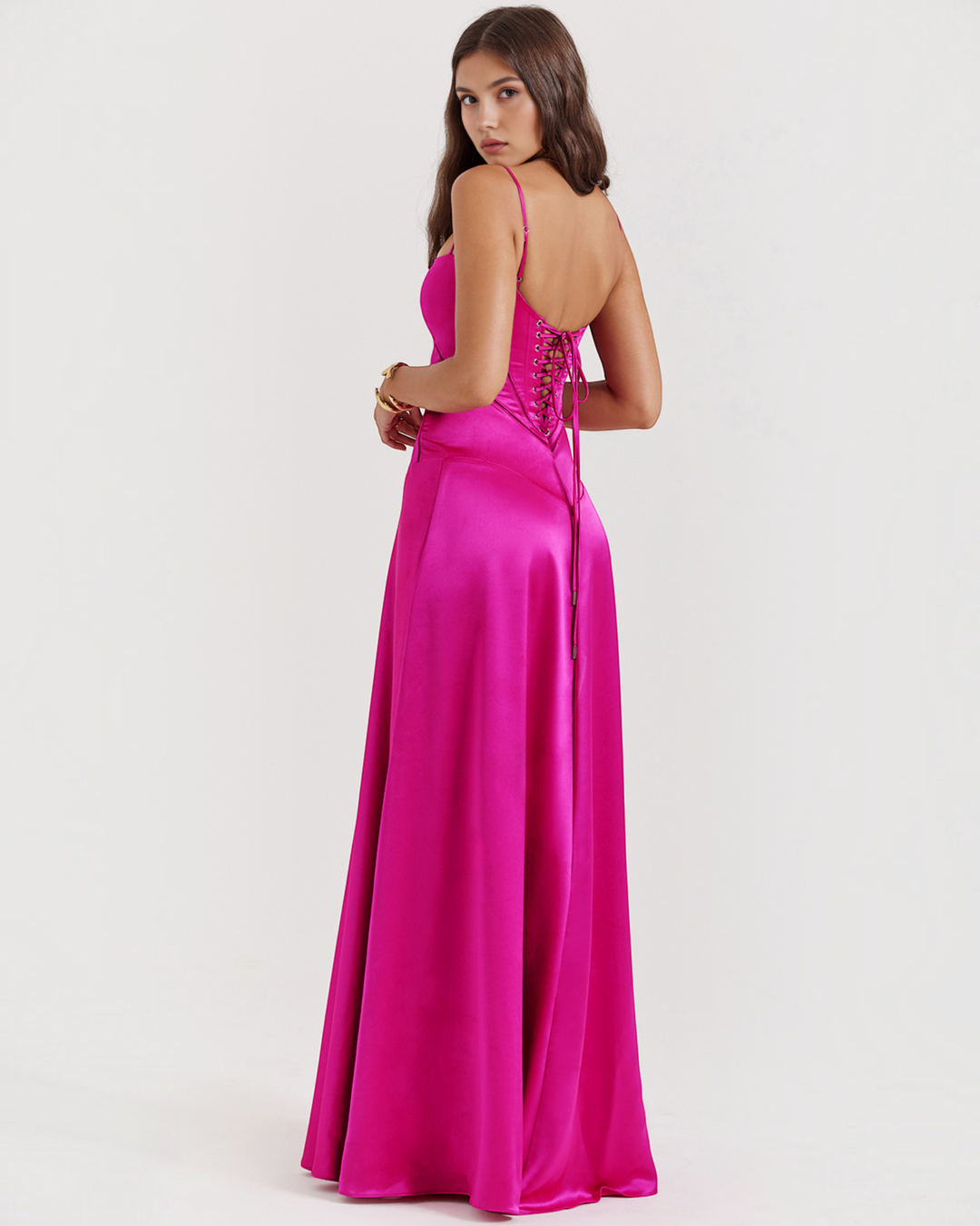 Luna Moda Noelle fuchsia satin bustier evening gown with lace-up back detail worn by a model