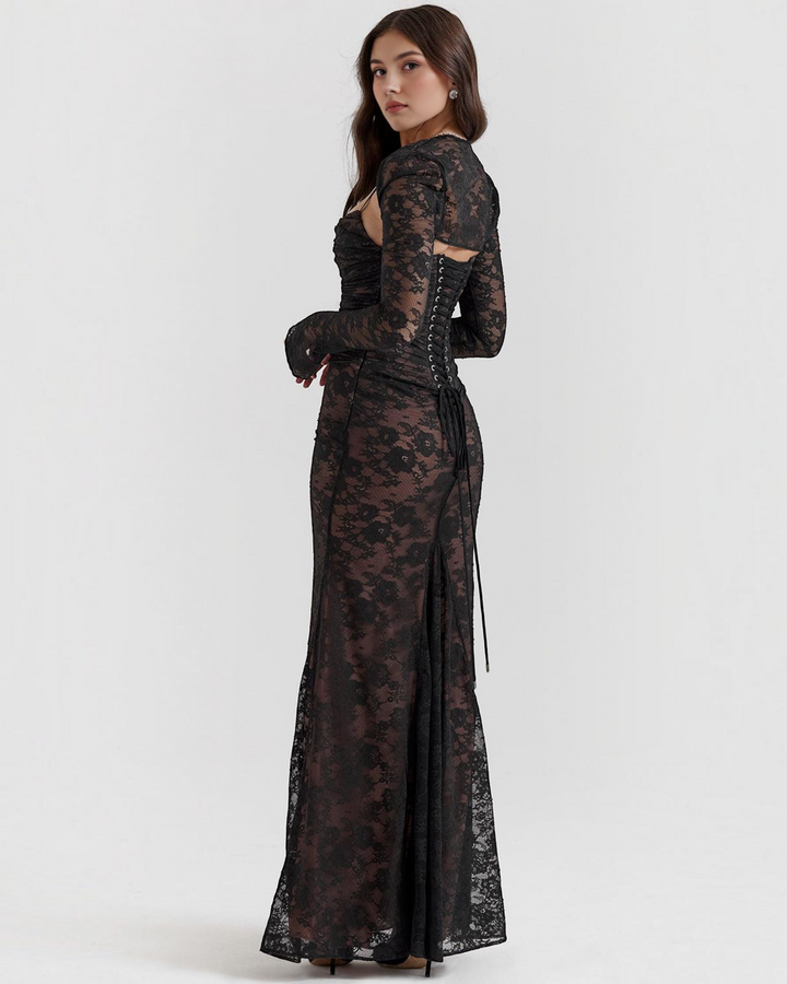 Luna Moda black lace maxi dress with a structured corset bodice and back lace-up detail worn by a model
