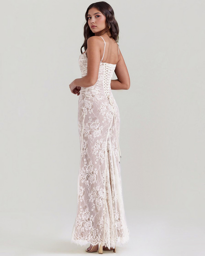 Luna Moda white lace maxi dress with a structured corset bodice and lace-up back detail worn by a model