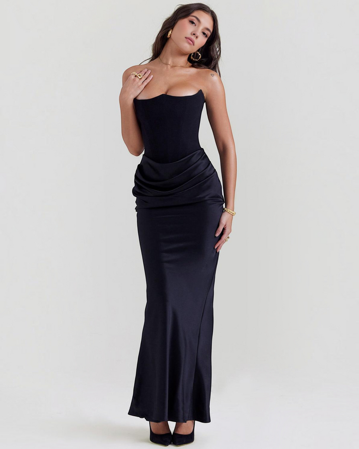Luna Moda black strapless satin gown with a fitted bodice and draped waist detail worn by a model