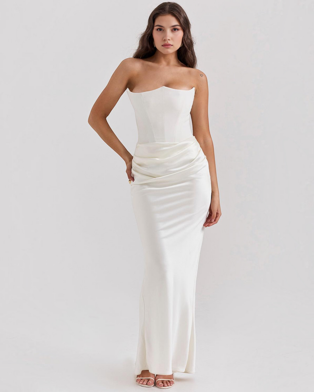 Luna Moda Serene strapless white satin gown featuring a corset-style bodice and elegant draped waist detail