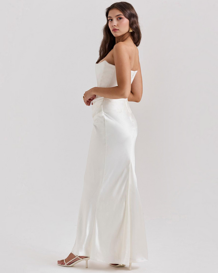 Luna Moda Serene strapless satin gown in mint green with a draped waist, worn by a model in a studio setting.