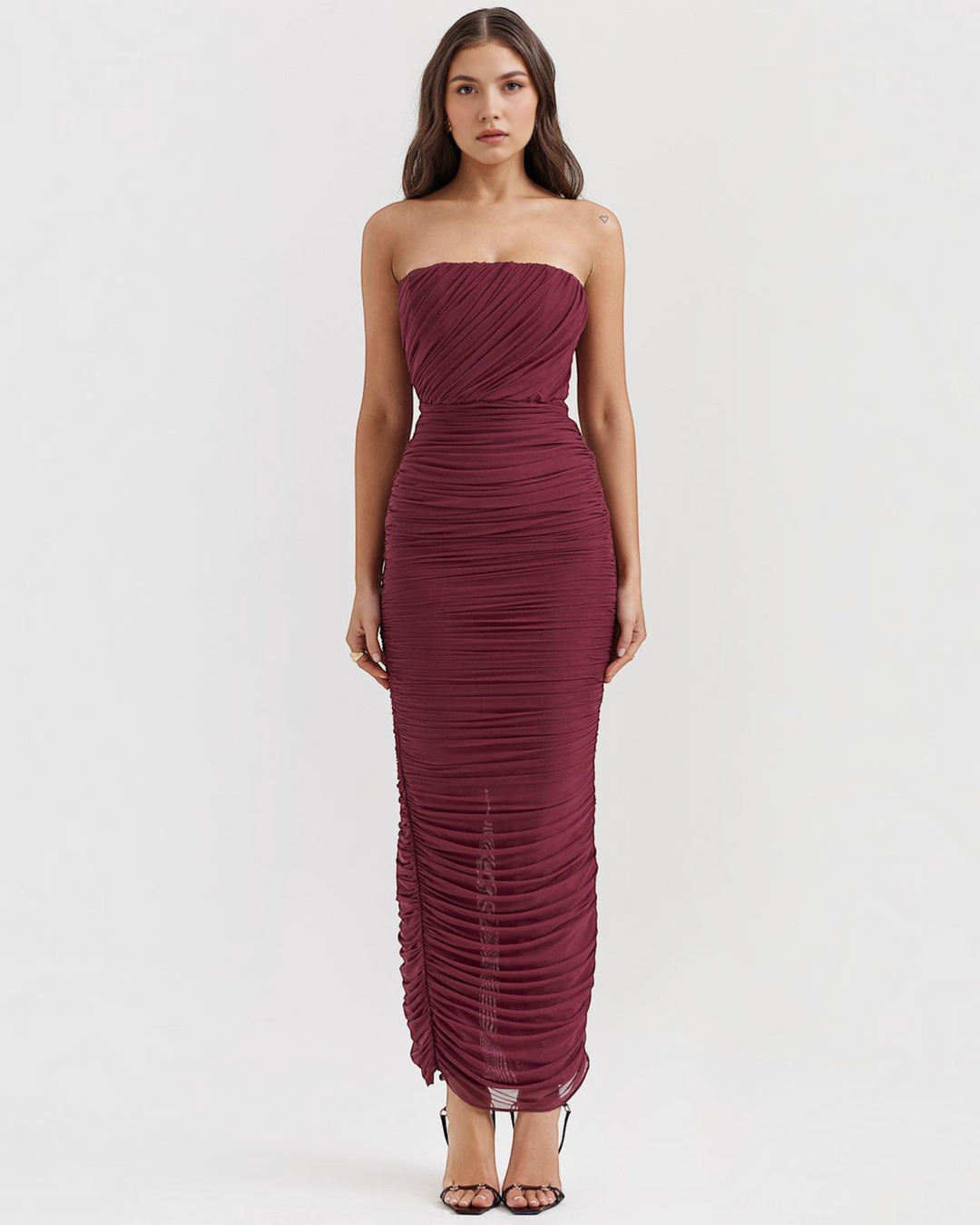 Luna Moda Amaris strapless burgundy mesh maxi dress with ruched detailing and a fitted silhouette on a model