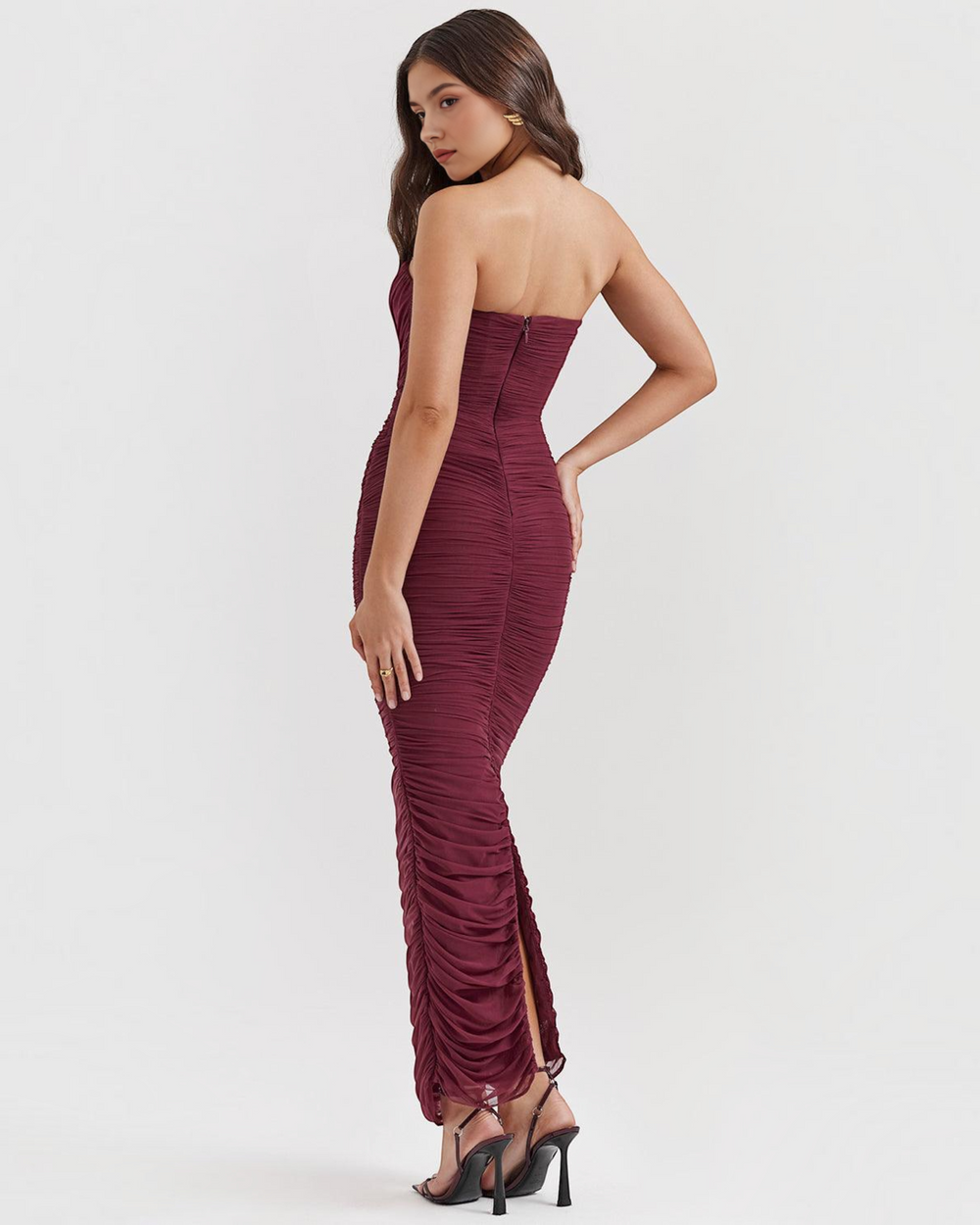 Luna Moda Amaris strapless burgundy mesh maxi dress with ruched detailing and side slit on a model