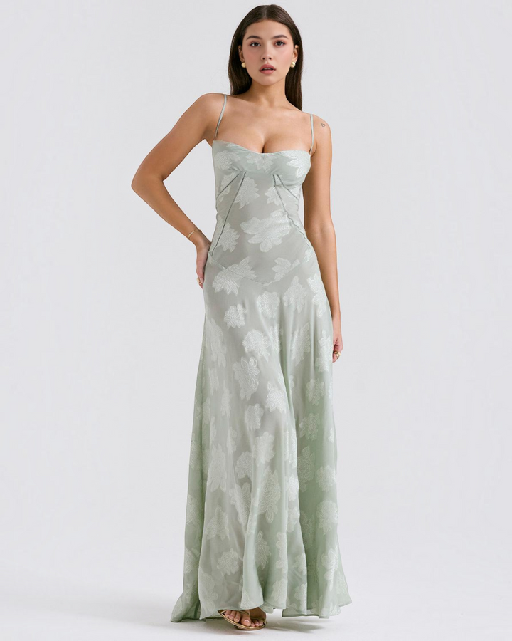 Luna Moda sage green floral maxi dress with a sweetheart neckline and spaghetti straps worn by a model.