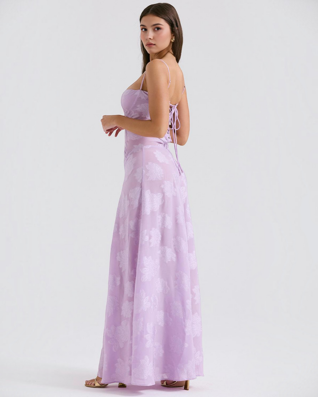 Luna Moda lilac floral maxi dress with sweetheart neckline and lace-up back worn by a model