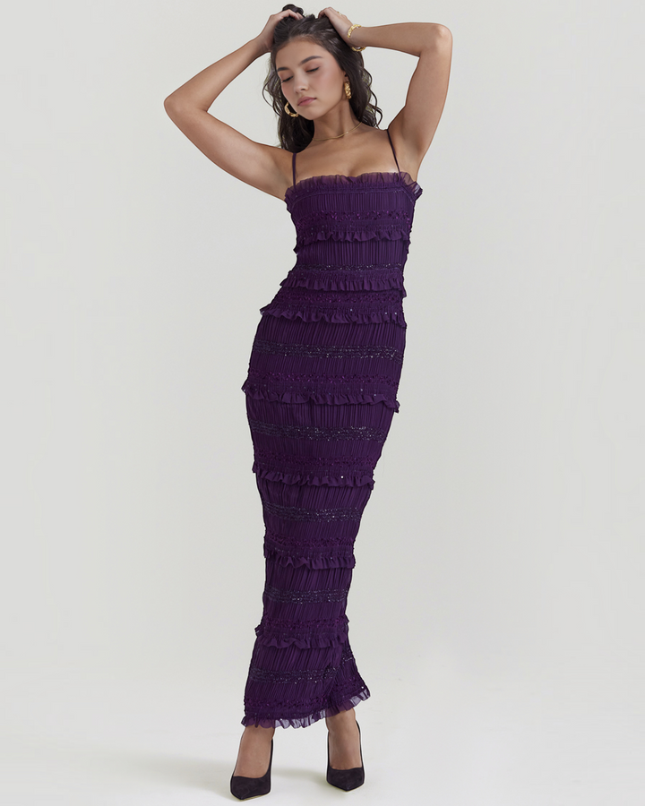 Luna Moda Solara maxi dress in deep purple satin with sequin pleats, ruffles, and spaghetti straps on a model.