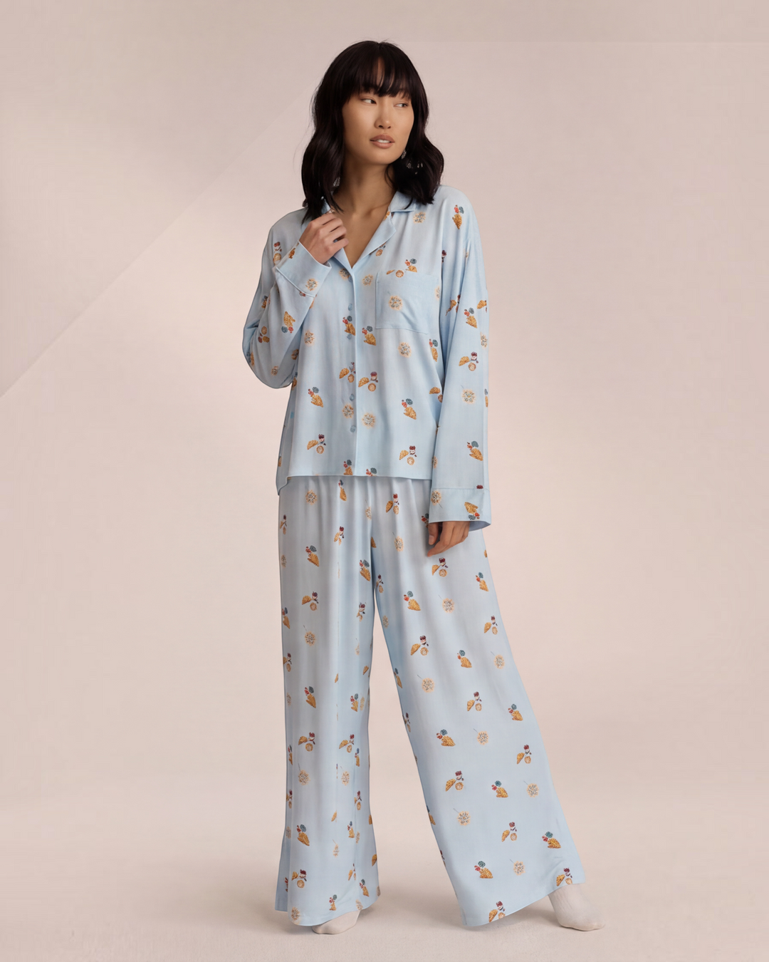 Luna Moda light blue button-up pajama set with breakfast-themed print, featuring a relaxed shirt and wide-leg pants.