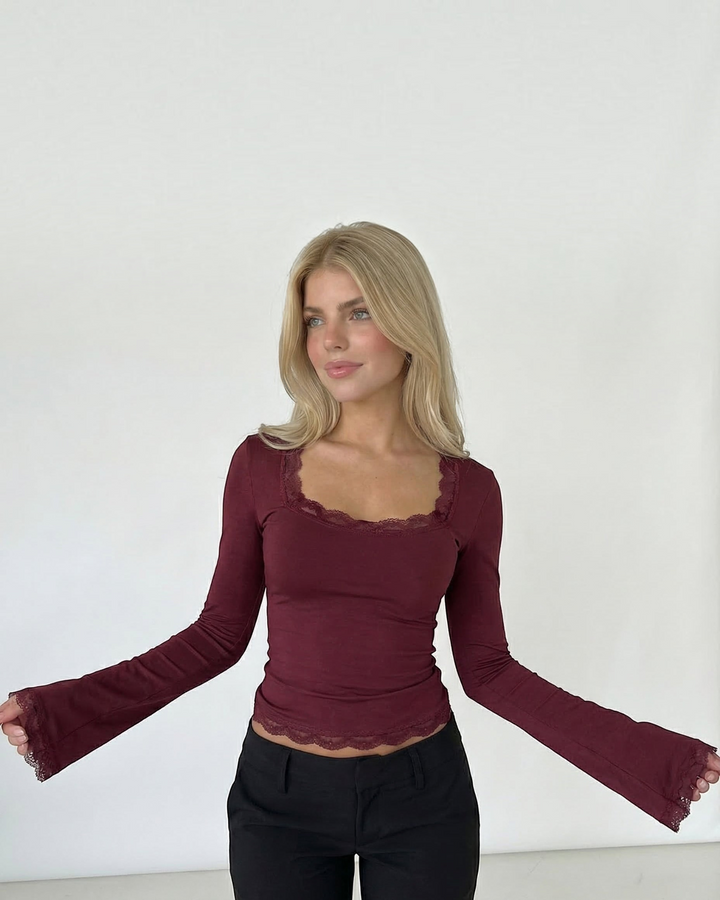 Luna Moda burgundy long-sleeve top with square neckline and delicate lace trim worn by a blonde model