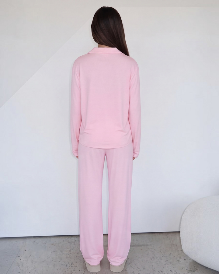 Luna Moda blush pink lounge set featuring a long-sleeve button-down shirt and wide-leg trousers, back view.