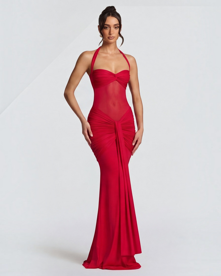 Luna Moda red mermaid gown featuring a mesh waist panel, halter neckline, and ruched hip detailing on a model.