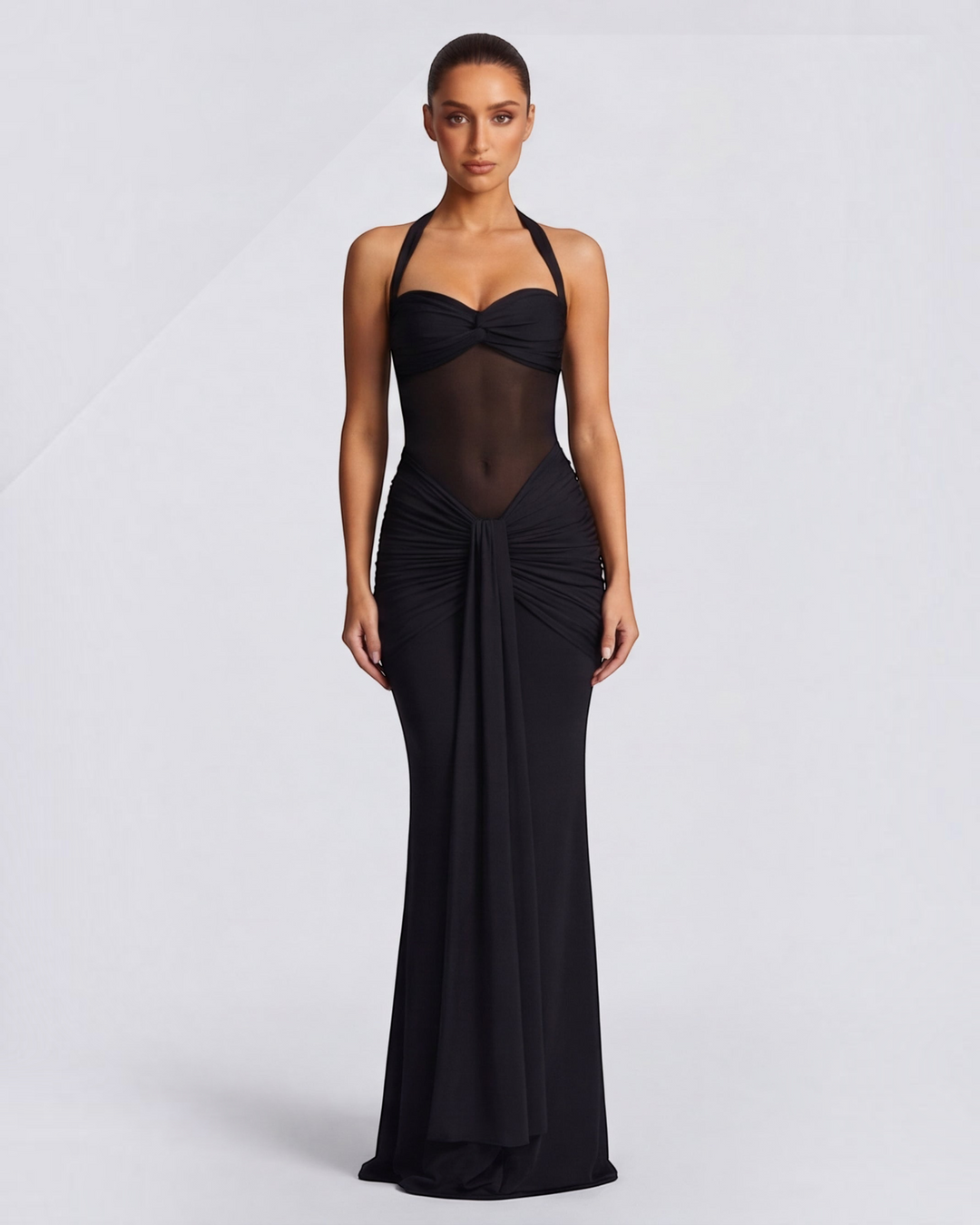 Luna Moda black mermaid evening gown with mesh waist detail and ruched hips on a model