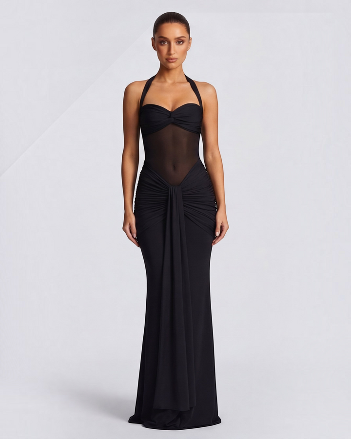 Luna Moda black mermaid evening gown with mesh waist detail and ruched hips on a model