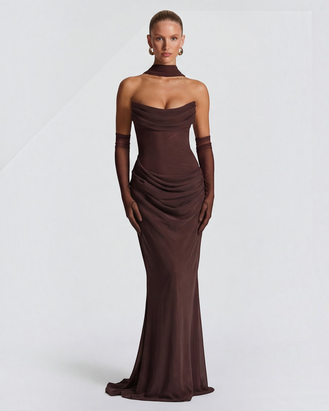 Luna Moda brown maxi dress with a sculpted draped bodice, smoothing silhouette, and elegant floor-length design.