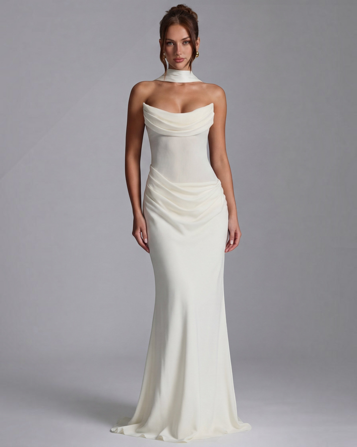 Luna Moda white maxi dress with a sculpted draped bodice and elegant floor-length silhouette on a model