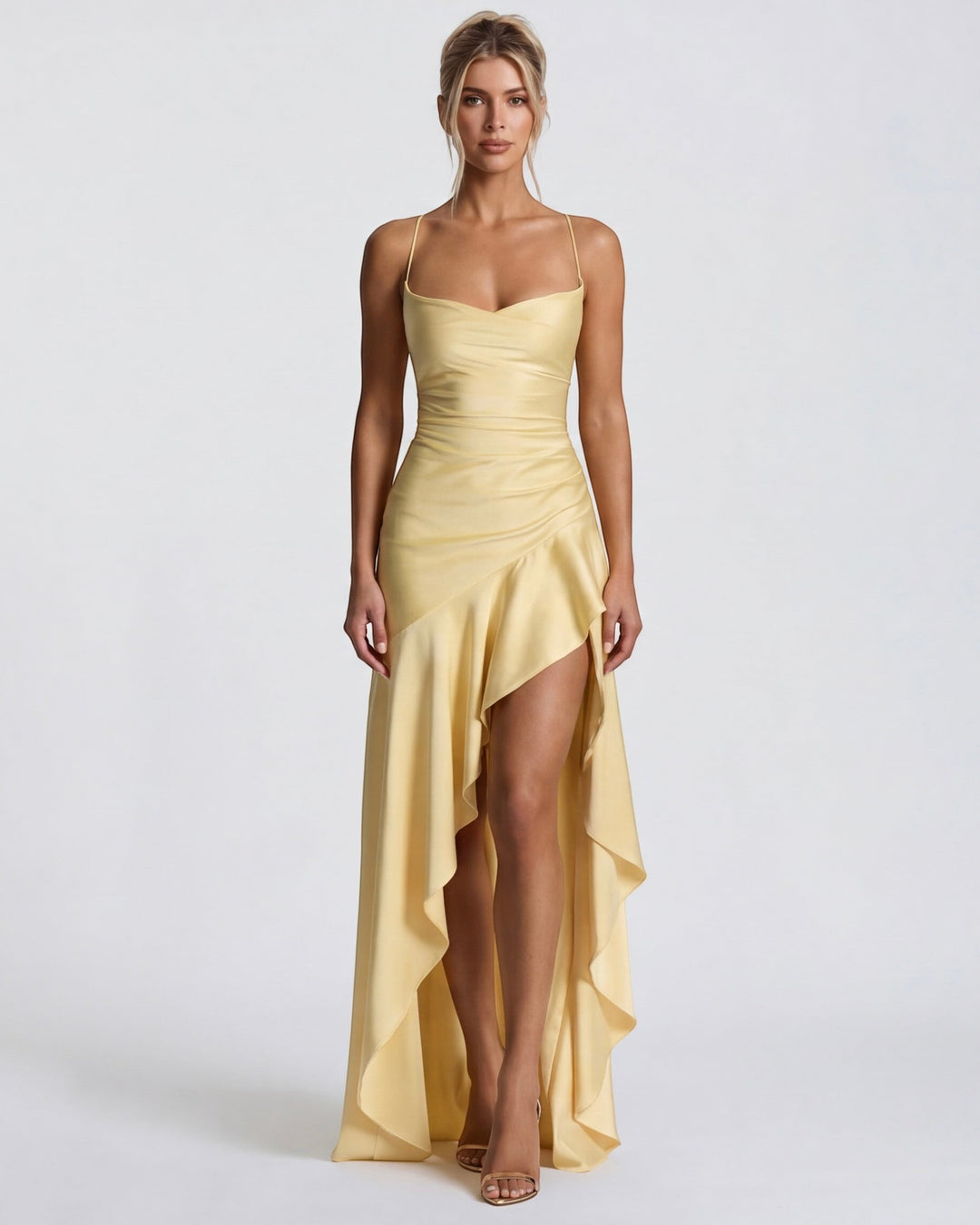 Luna Moda Muse yellow satin evening gown with draped bodice, high leg slit, and delicate cross-back spaghetti straps.