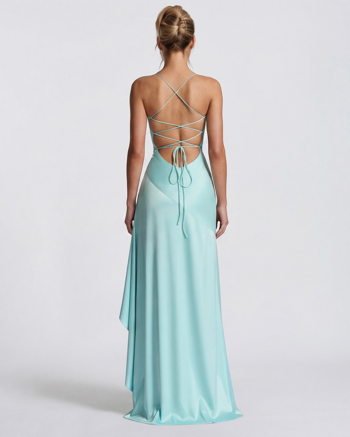 Luna Moda Muse back view of a light blue satin evening gown with a draped cowl neck and adjustable lace-up back.