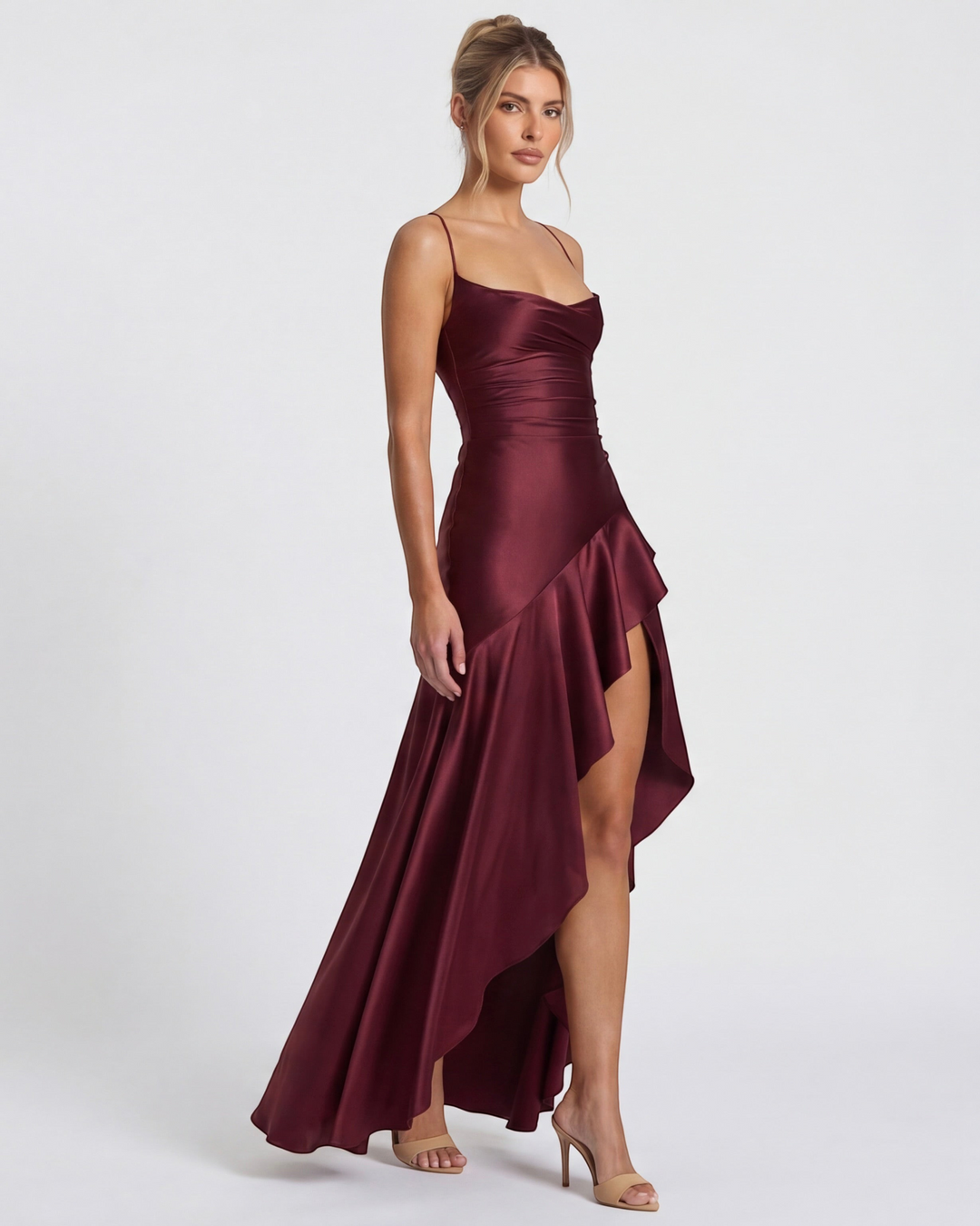 Luna Moda Muse red satin evening dress with draped neckline, high slit, and crisscross ties on a model