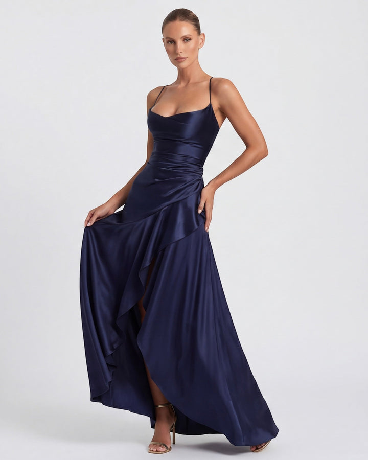 Luna Moda Muse navy blue satin evening gown with draped neckline, high slit, and adjustable crisscross straps.