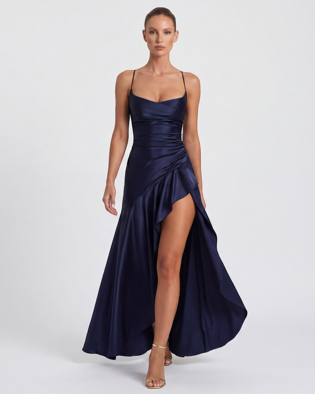 Luna Moda navy blue satin evening gown with a draped bodice, high leg slit, and delicate spaghetti straps.