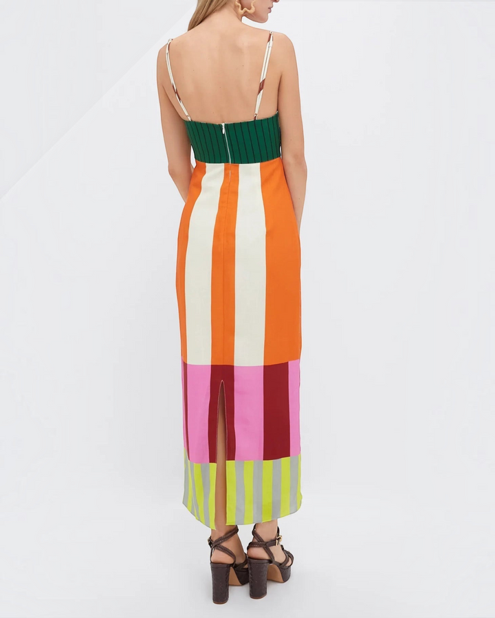 Luna Moda Paloma maxi dress with vibrant geometric stripes, thin straps, empire waist, and back slit, rear view.