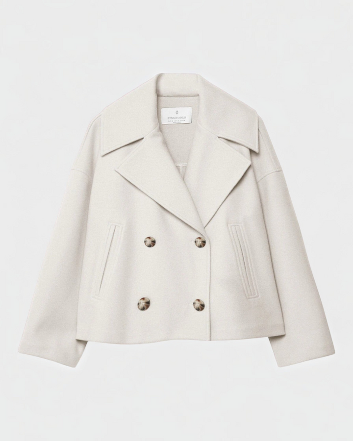 Luna Moda Costanza cream double-breasted short jacket with wide lapels and tortoiseshell buttons