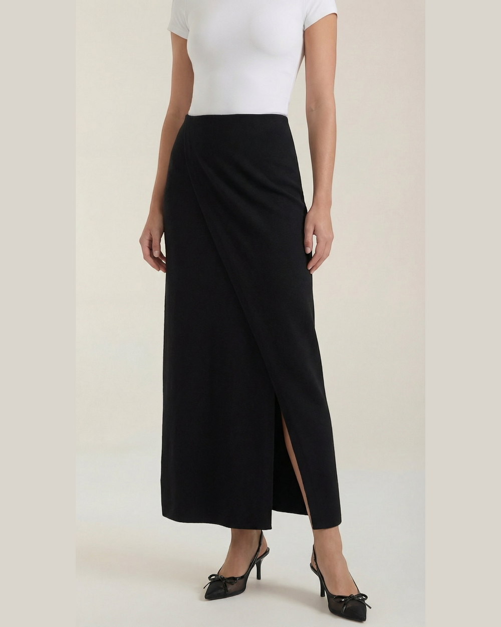 Luna Moda black midi wrap skirt in soft knit fabric worn with a white t-shirt and black heels