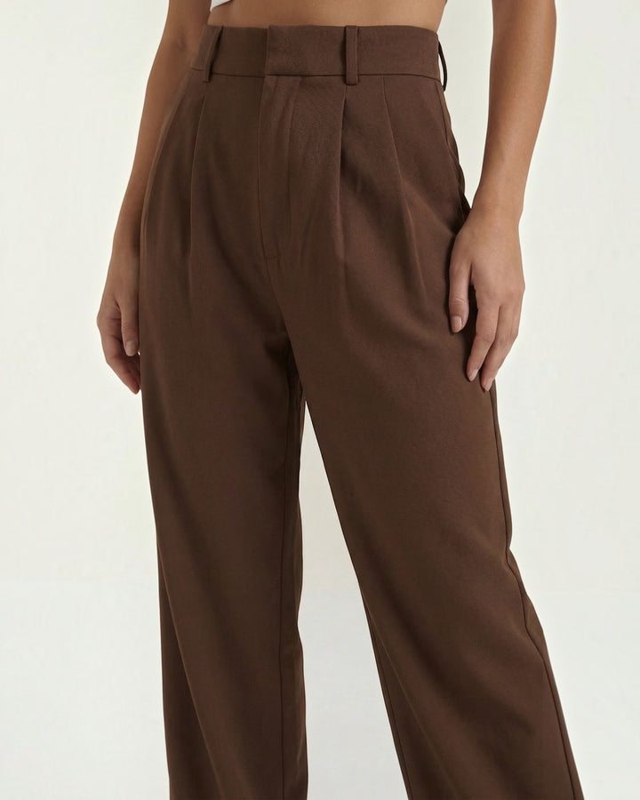 Luna Moda high-waisted brown pleated palazzo trousers with a tailored fit and wide-leg silhouette.