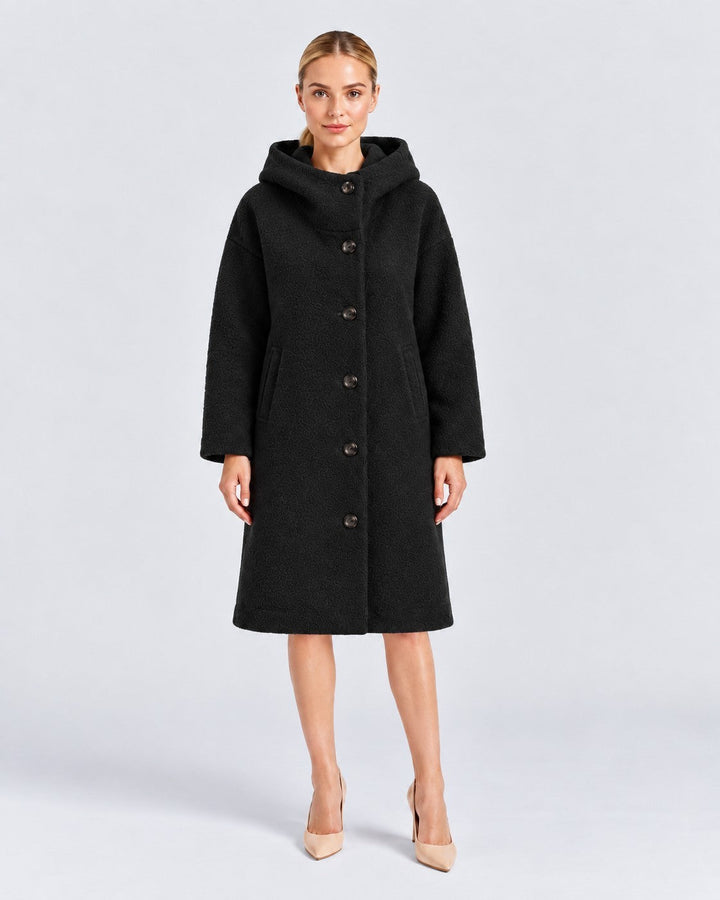 Luna Moda Adelaide black textured wool-blend coat with a high collar and hood worn by a model