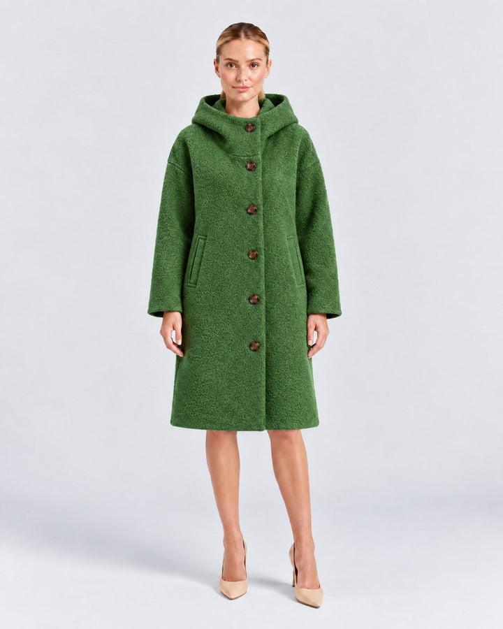 Luna Moda Adelaide green textured wool coat with a high collar and hood worn by a model against a grey background.