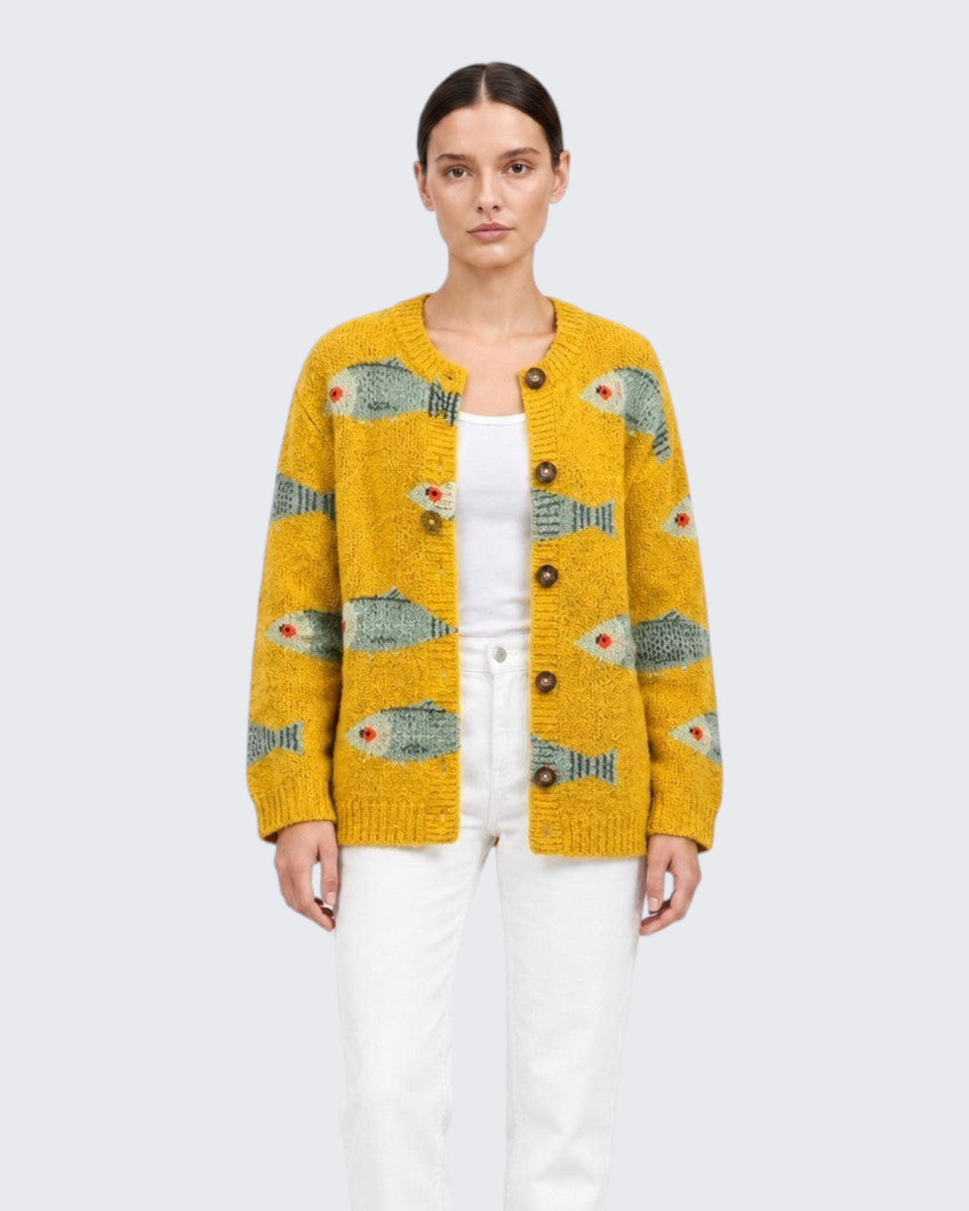Luna Moda Allegra cardigan in vibrant golden yellow knit with a playful fish print and round vintage buttons