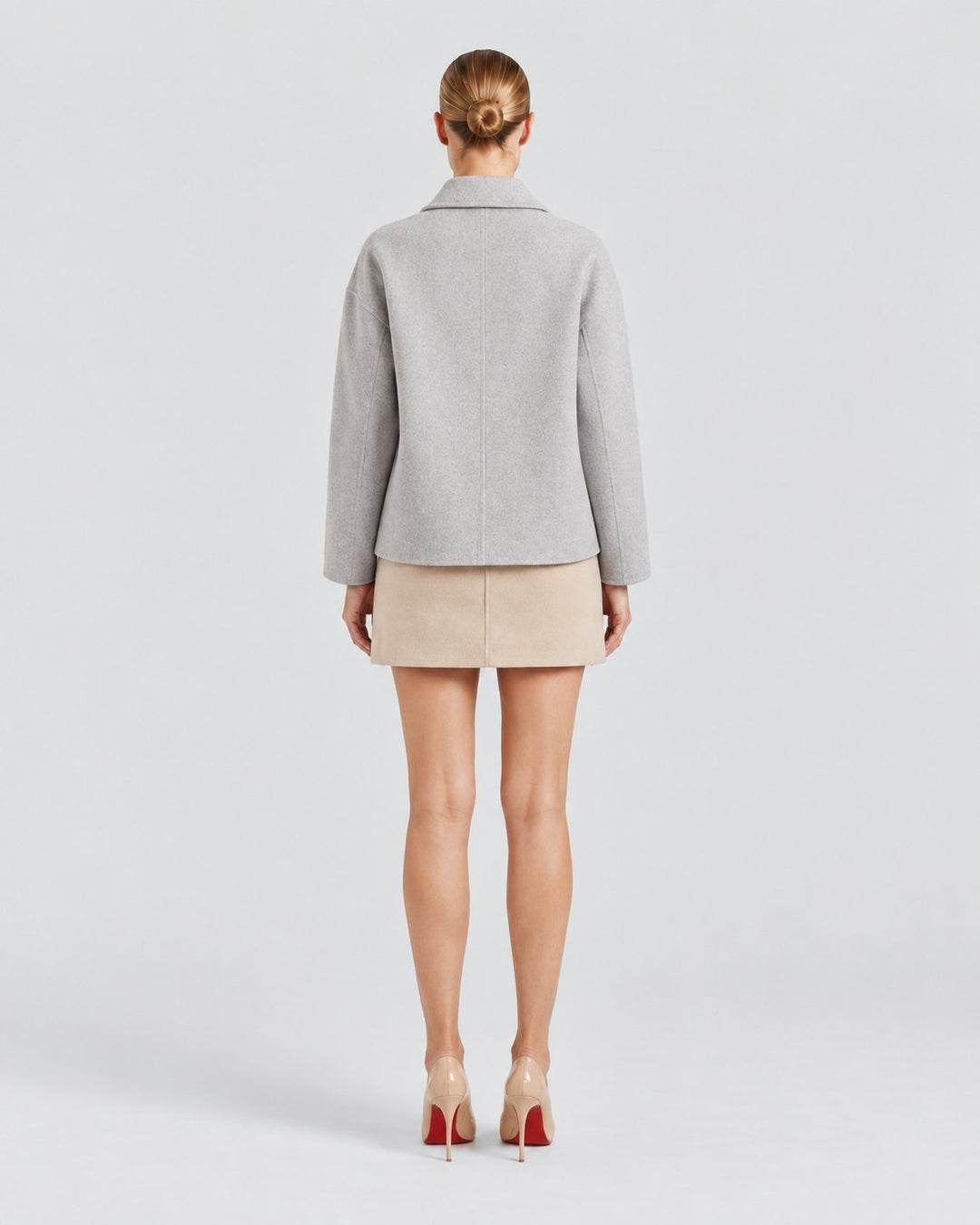 Luna Moda Amanda grey oversized coat worn by a model, back view showing classic collar and relaxed fit