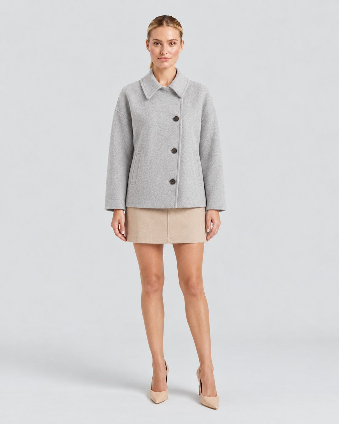 Luna Moda Amanda grey oversized wool coat with asymmetric button closure and classic collar worn by a model