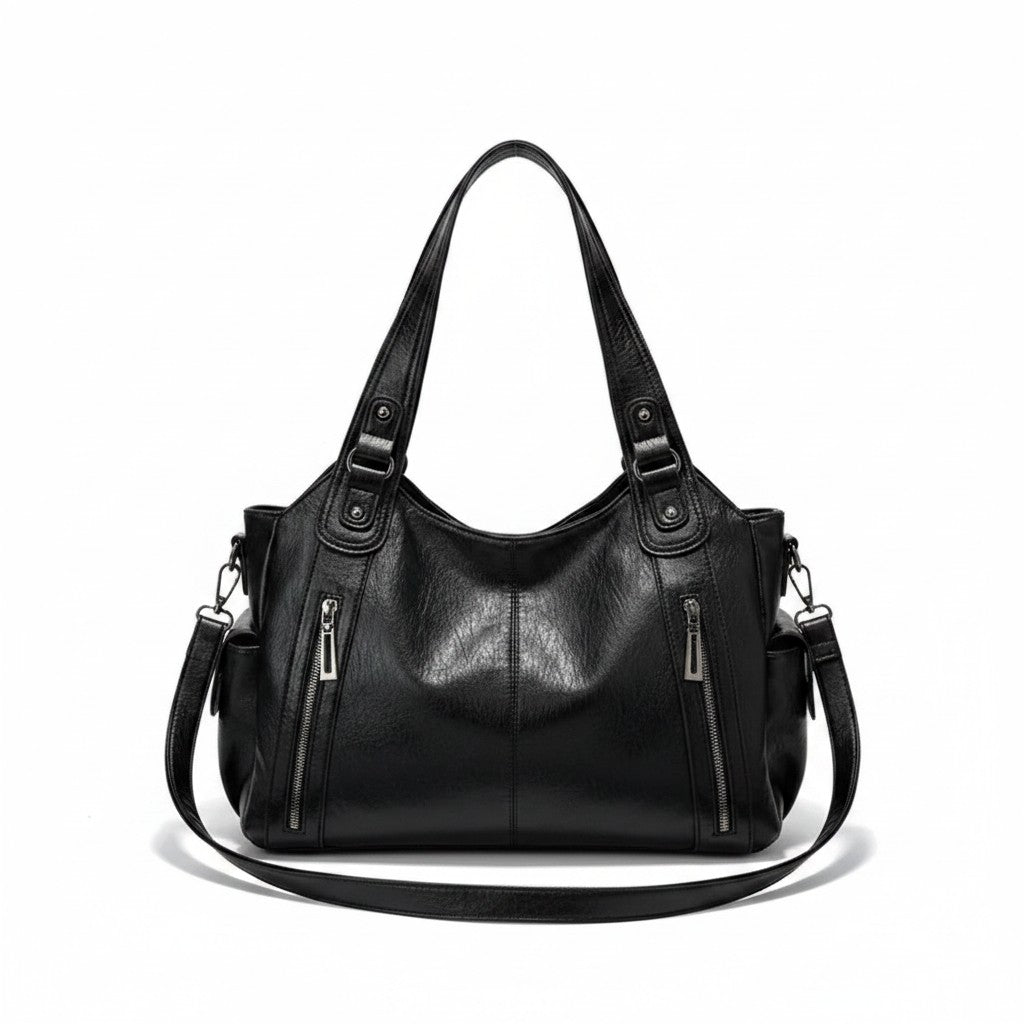 Luna Moda Amber black leather handbag with adjustable handle, front zipper pockets, and a spacious structured design.