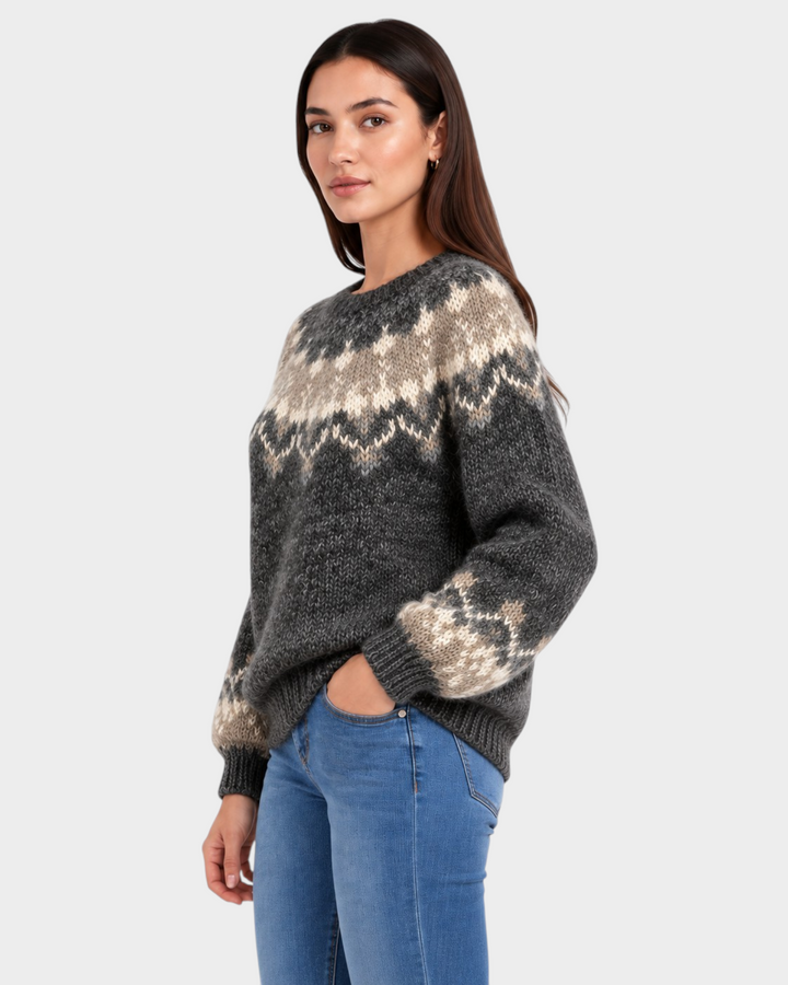 Luna Moda Amelia handmade grey and beige Nordic pattern wool sweater worn by a woman with blue jeans