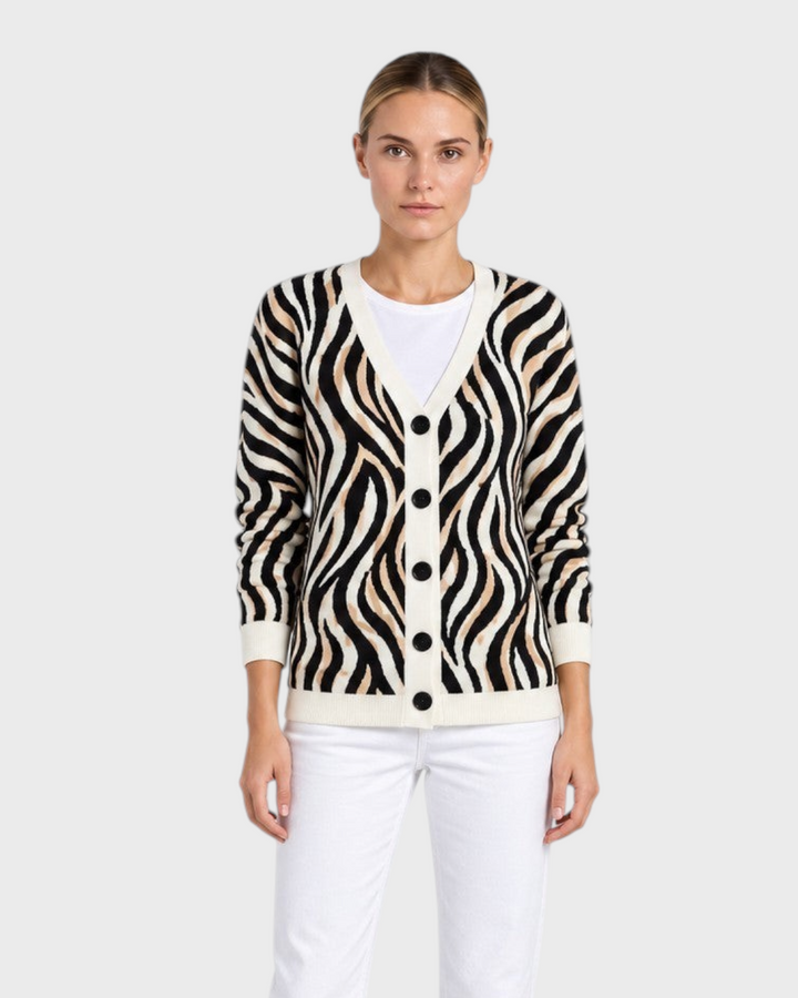 Luna Moda Serena cardigan featuring a brown, black, and white zebra animal print with a V-neck and button closure.