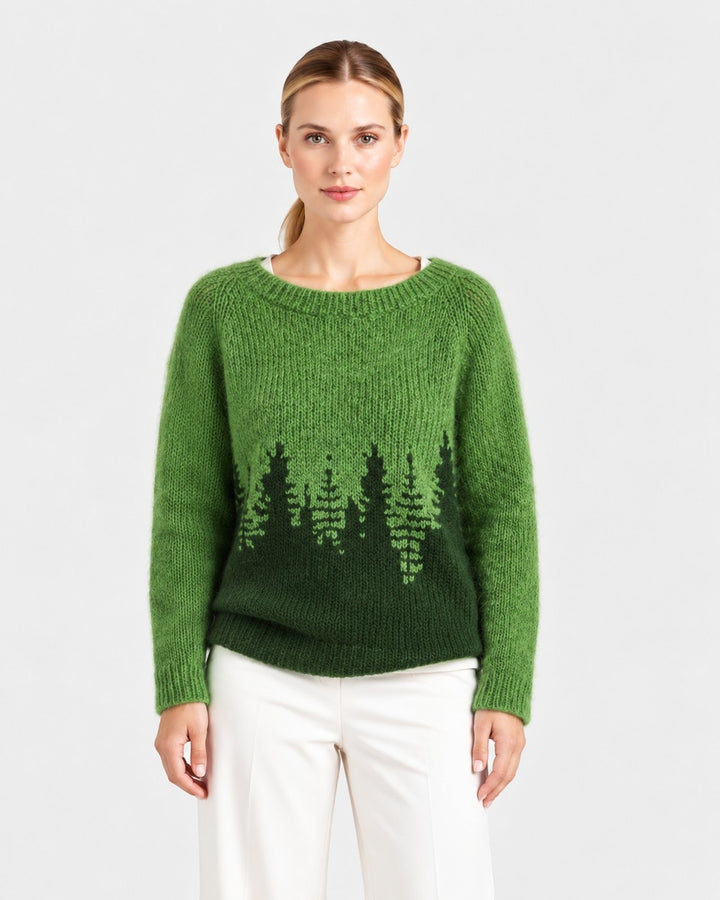 Luna Moda Annalisa green textured knit sweater with a forest tree pattern worn by a model on a white background.