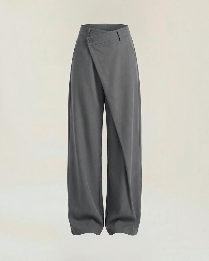 Luna Moda Licia wide-leg trousers in charcoal grey with an asymmetric wrap front panel and button detail.