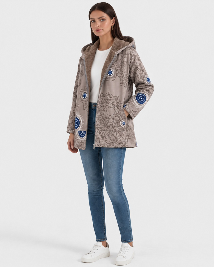 Luna Moda Aurora hooded jacket in beige with geometric patterns and soft sherpa lining worn by a model