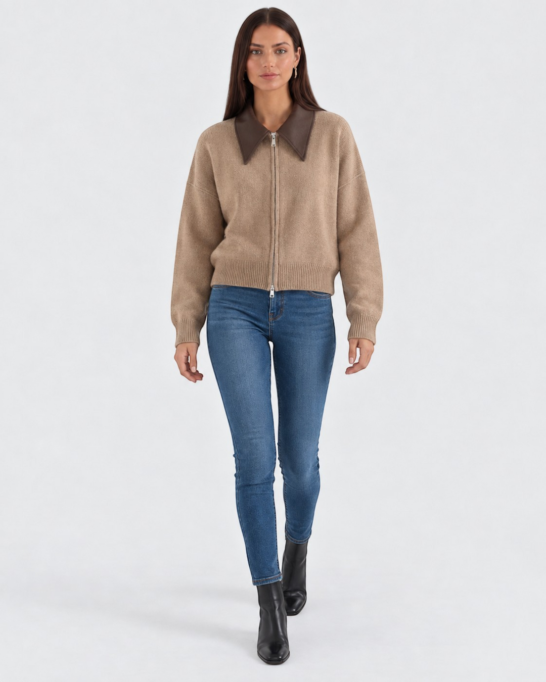 Luna Moda cropped cardigan in beige knit with a contrasting brown collar and double zip front worn with blue jeans.