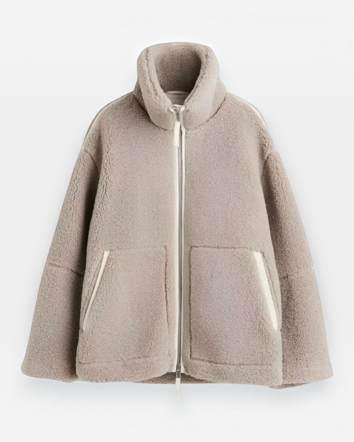 Luna Moda Anastasia beige fleece zip-up coat with a high collar and front pockets for winter comfort.