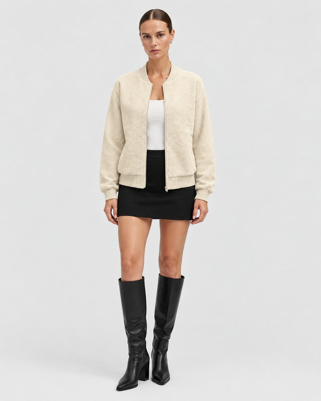 Luna Moda beige bomber jacket with geometric pattern, ribbed cuffs, and front zipper worn by a model