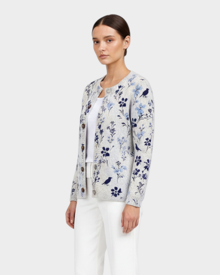 Luna Moda Benedetta cardigan with vintage blue bird and floral print, wooden buttons, and long sleeves on a model.
