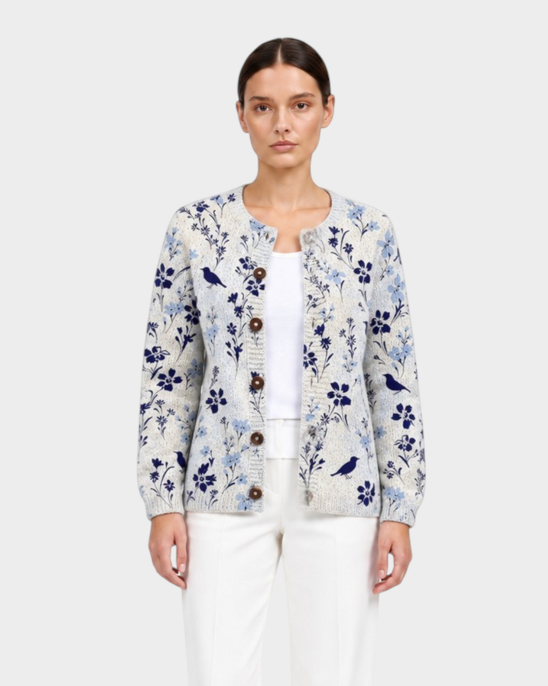 Luna Moda Benedetta cardigan with vintage navy blue bird and flower print, wooden buttons, and long sleeves.