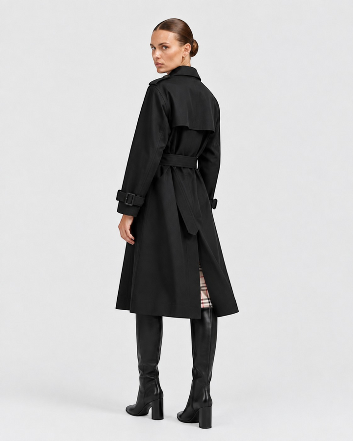 Luna Moda black double-breasted trench coat with waist belt worn by a model, back view