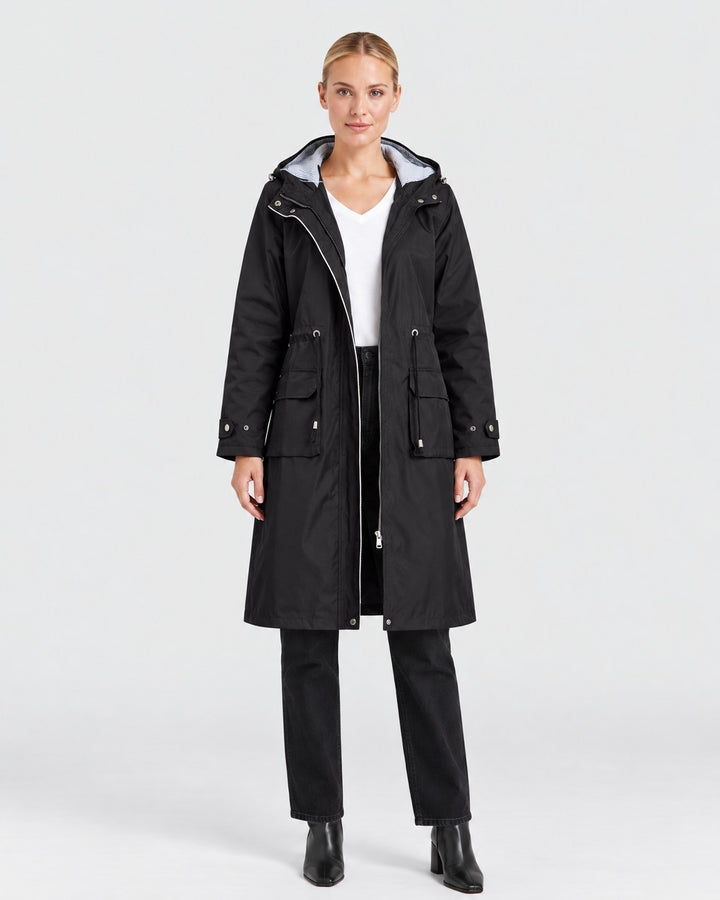 Luna Moda black lightweight hooded trench coat with adjustable waist and elastic cuffs worn by a woman