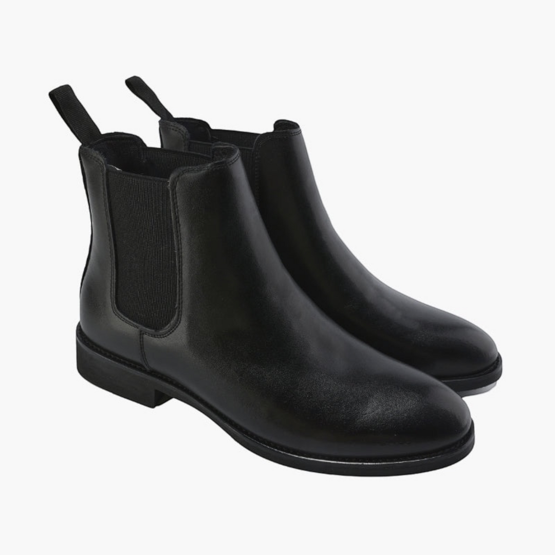 Luna Moda black leather Chelsea boots with elastic side panels and pull tabs for a sleek, versatile slip-on style.