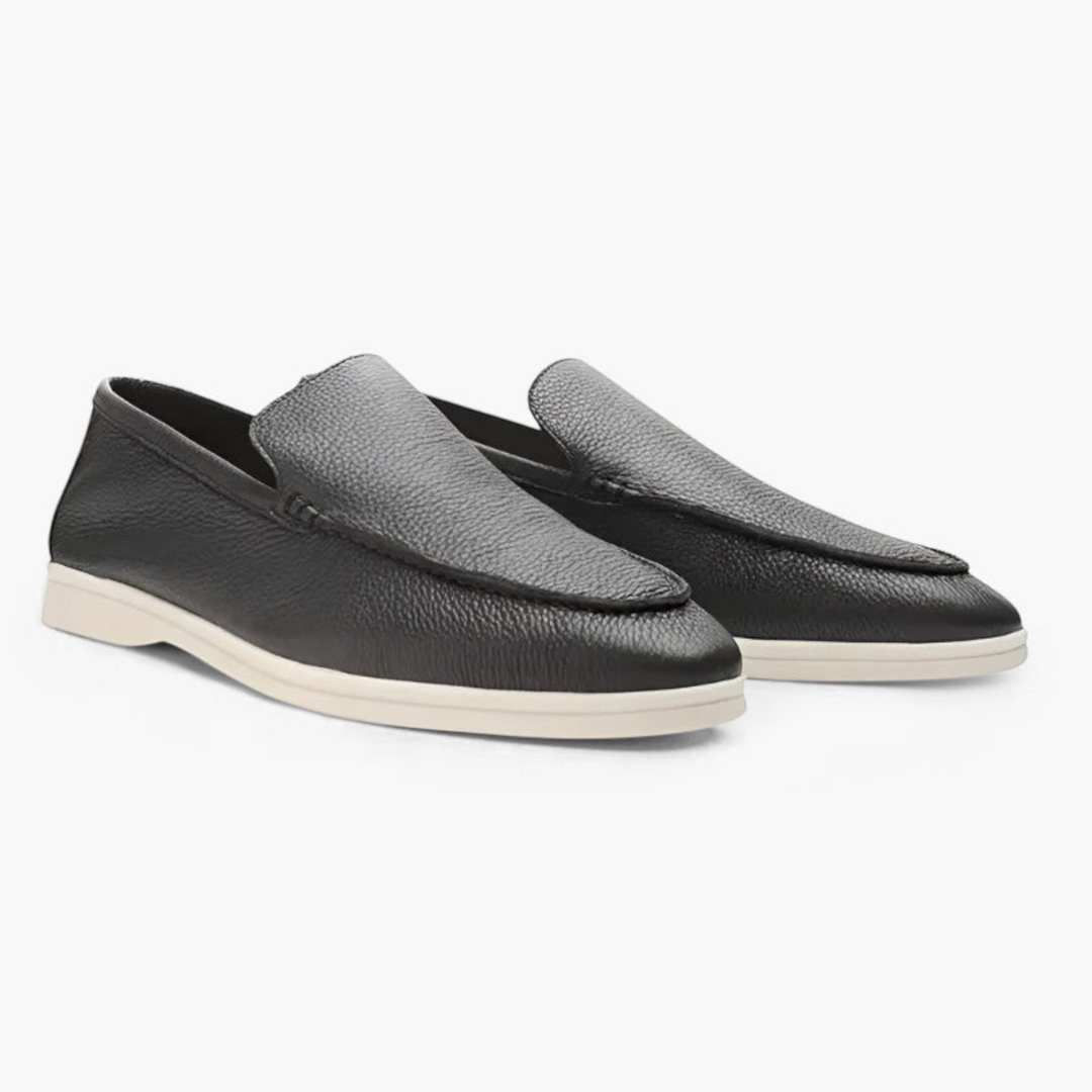 Luna Moda black leather loafers with stitched upper and white rubber sole for a casual refined look