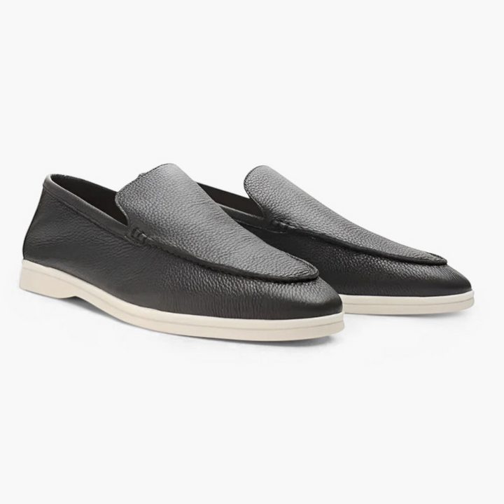 Luna Moda black leather loafers with stitched upper and white rubber sole for a casual refined look