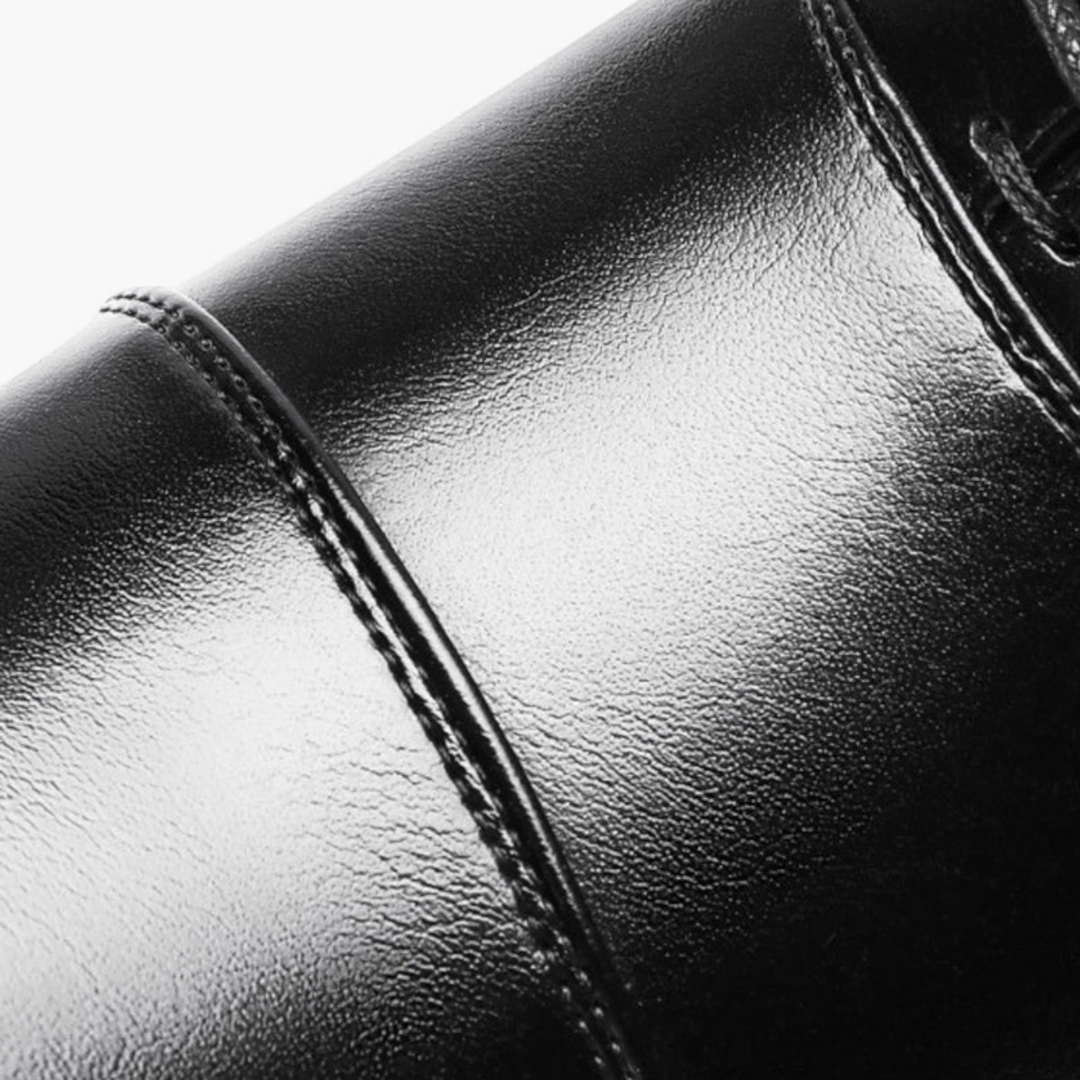 Luna Moda Ettore black leather loafers featuring fine stitching detail on the upper for an elegant casual look.